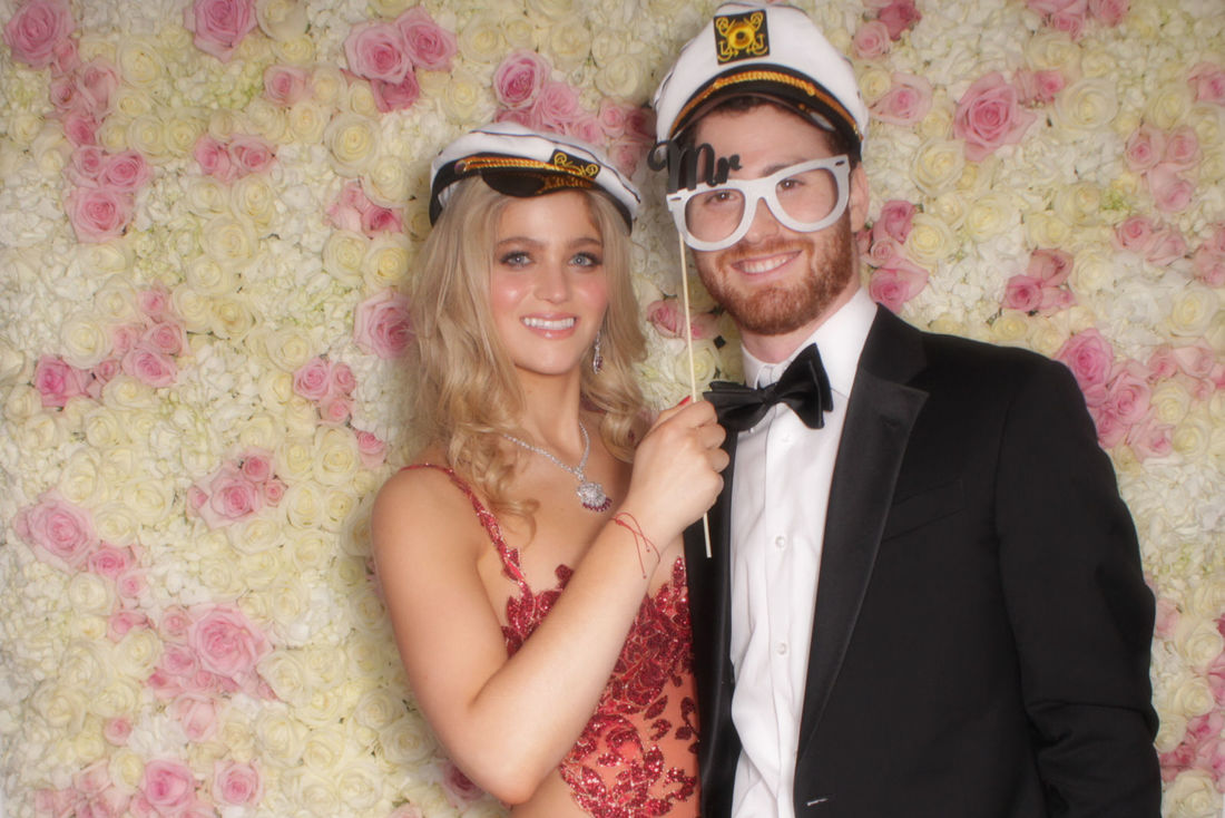 couple in photo booth at wedding